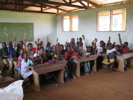 Children holding Pencils